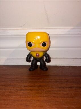 Yellow & Black Superhero Vinyl Figure